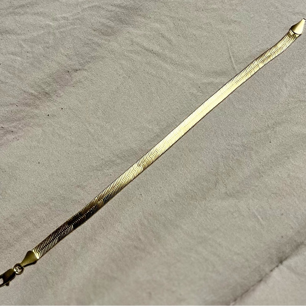 8 inch, 14 karat gold herringbone bracelet